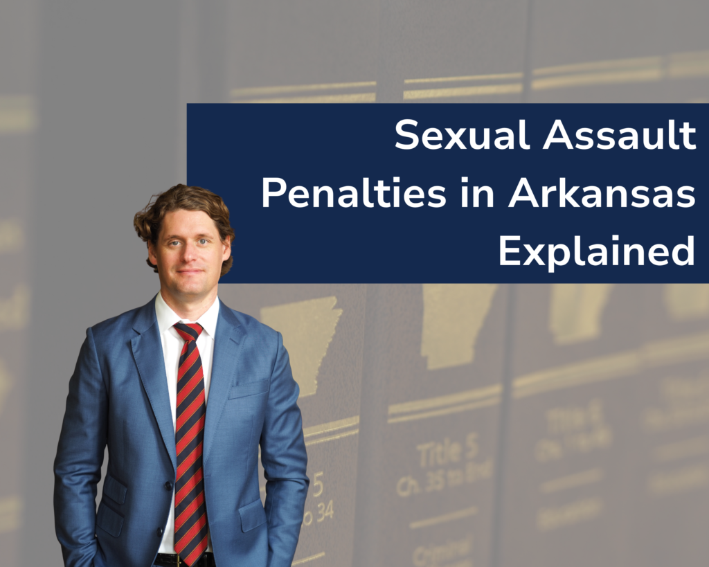 Criminal attorney Kale Ludwig in blue suit with red tie in the foreground, close-up of the Arkansas Code Annotated in the background.